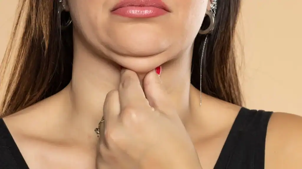 An image of a woman with double chin, sad, worried : Non Surgical Double Chin Removal Treatment in Oxford, UK